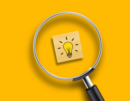 Billede af lup og pære, der lyser