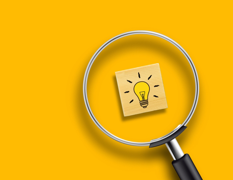 Billede af lup og pære, der lyser